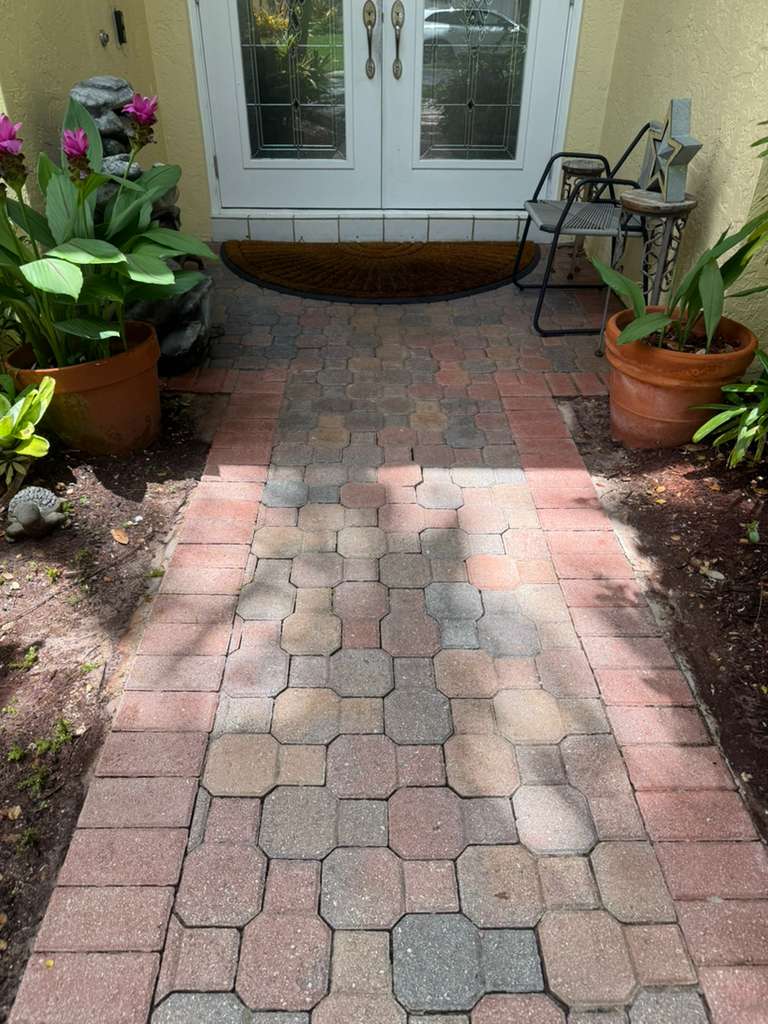 Driveway Pressure Cleaning - After professional lawn care and landscaping service by The Fresh Feel in South Florida